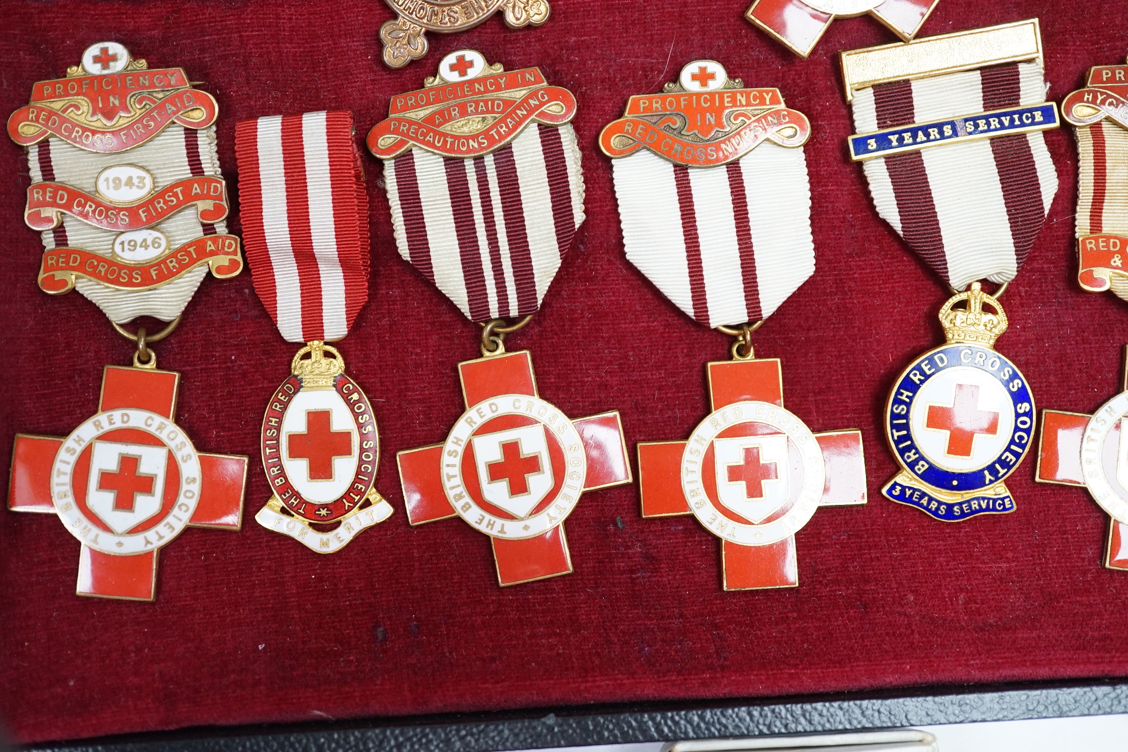 A collection of British Red Cross, etc. medals, awards and memorabilia including medals in original card boxes, a WWII medal group with miniatures including a Voluntary Medical Services Medal, proficiency in first aid me